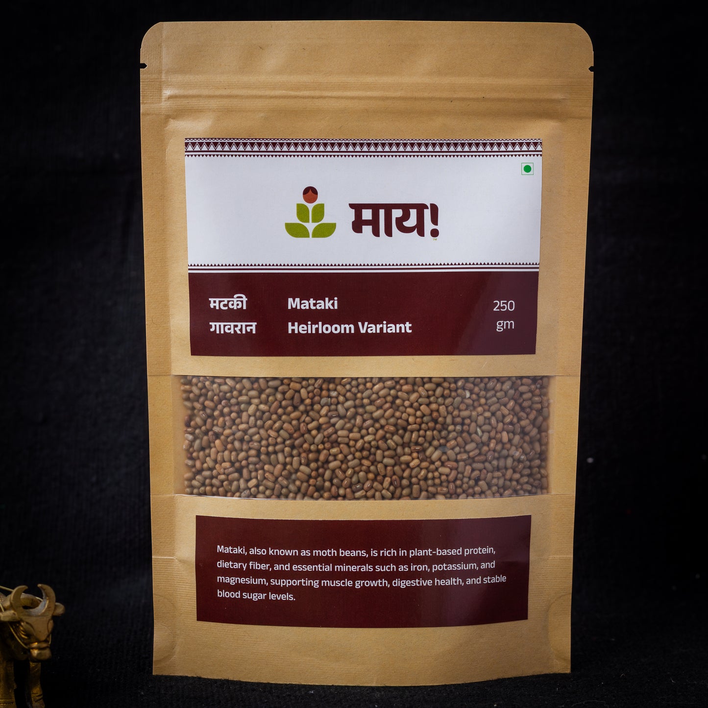 Kraft paper packaging of Mataki with a label on a black background